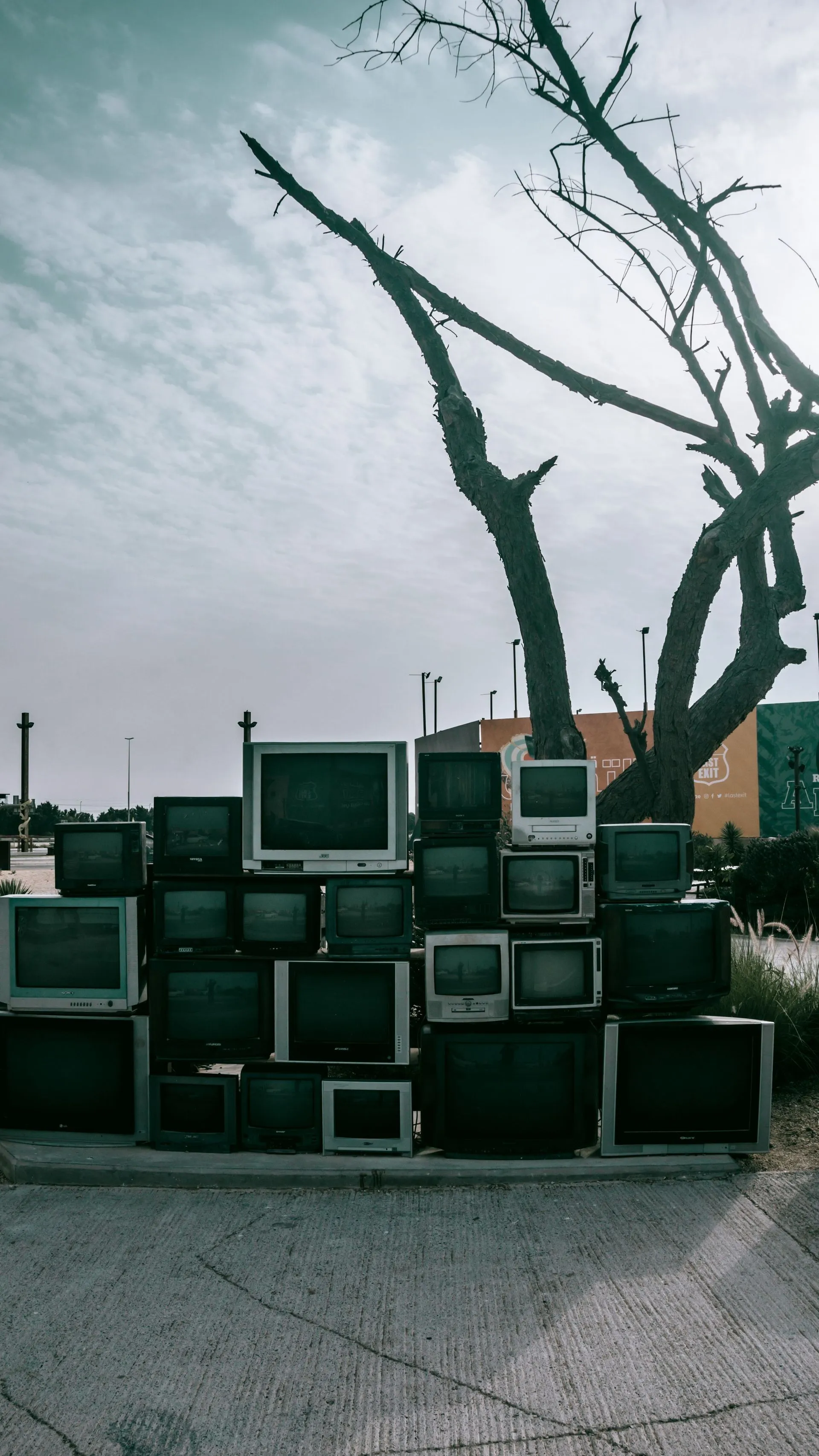 Stacked TVs collected for recycling